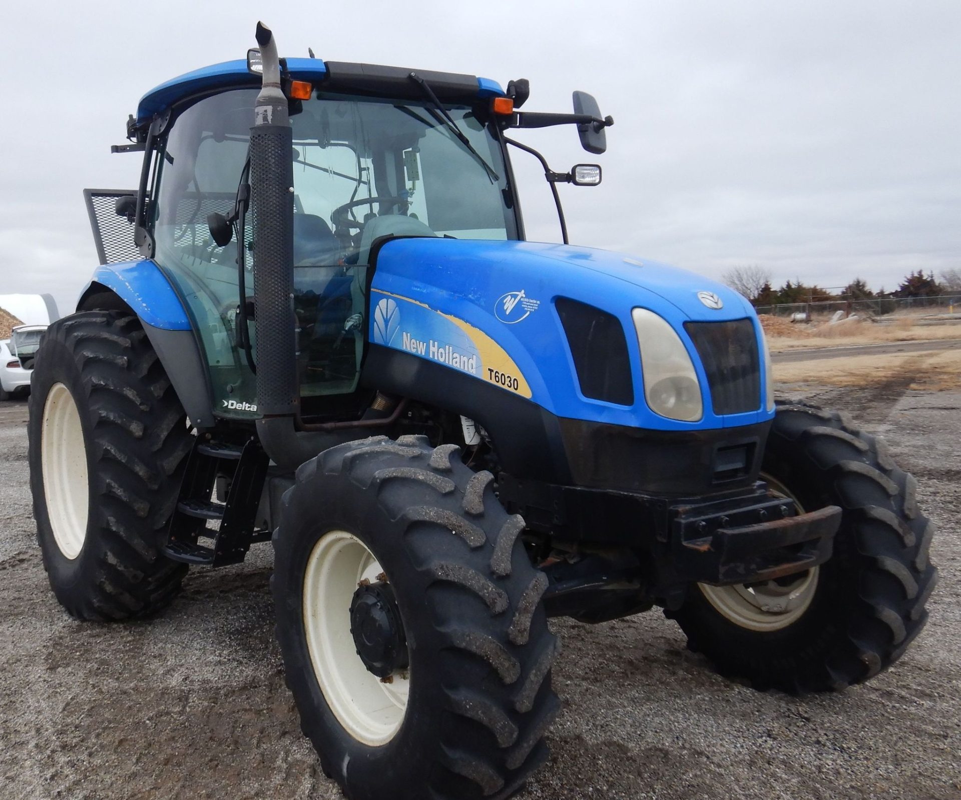 2009 New Holland T6030 - photo 1