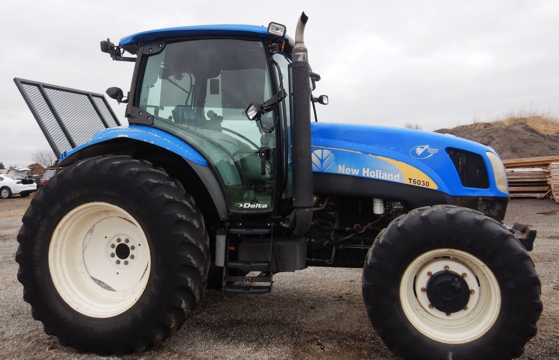 2009 New Holland T6030 - photo 1